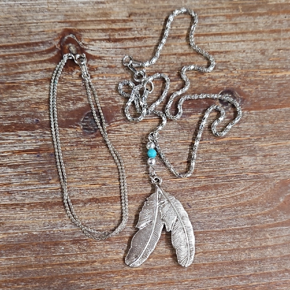 Silver Feather Pendant Necklace And Bracelet